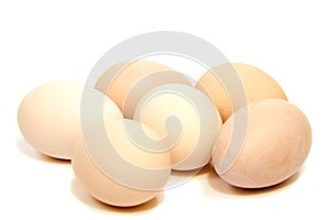 Broken egg in eggshell half and raw egg isolated