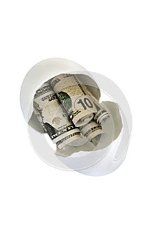 Broken egg with fake money