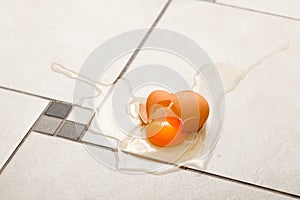 Broken egg on the floor