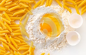 broken egg in flour and pasta