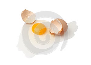 Broken Egg Isolated, Raw Yolk and White, Cracked Brown Shell, Fresh Broken Chicken Eggs on White Background