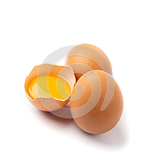 Broken Egg Isolated, Raw Yolk and White, Cracked Brown Shell, Fresh Broken Chicken Eggs on White Background