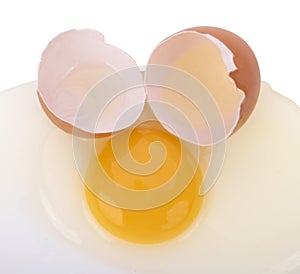 Broken egg isolated on white background