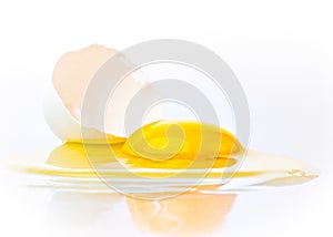 Broken egg on a white background