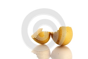 Broken eggshell isolated on white