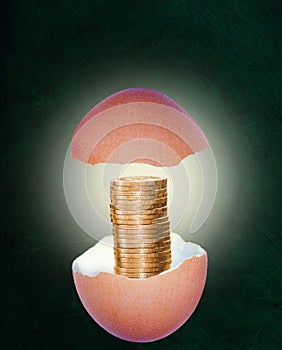 Broken Eggshell With Stack of Gold Coins in Retirement Nest Egg Concept