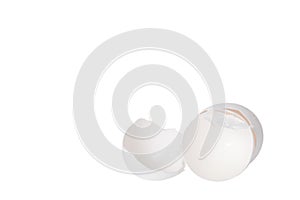 Broken eggshell on white background