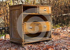 Broken, ejected retro dresser.