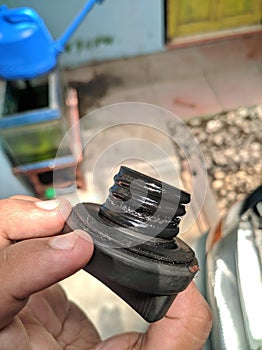 Broken Engine Oil Tube Cap from Old Car Toyota Kijang Krista Year 2000