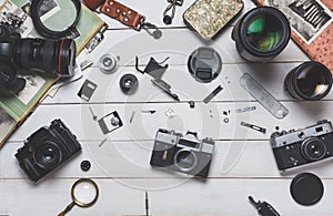 Broken film camera component repair and maintenance of photographic equipment concept