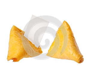 Broken fortune cookie with blank slip isolated