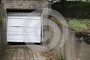 Broken Garage Door of an unkempt home