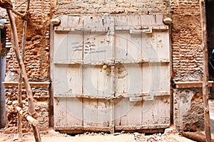 Broken gate of old ruined house in chandini chowk