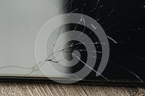 Broken glass on the black smartphone/broken glass on the black s