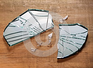 broken glass glasses mirror on wooden floor , generated by AI