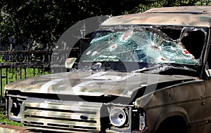 broken windshield of the paramedics machine. The texture of broken glass. Armored vehicle paramedics.