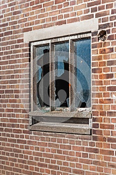 Broken glass panes of an old window