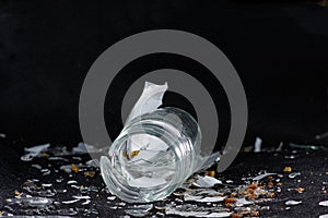 Broken glass photographed in front of black background