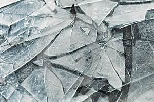 Broken glass is scattered a lot. Glass shards. Insurance, Damage, decline, destruction, vandalism, crime concept