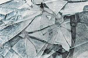 Broken glass is scattered a lot. Glass shards. Insurance, Damage, decline, destruction, vandalism, crime concept photo