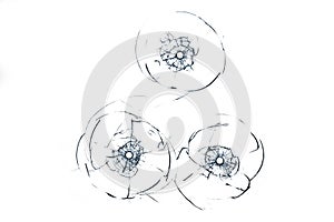 Broken glass triple bullet holes in glass isolated on white