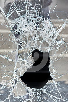 Broken glass by vandals in a shop