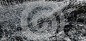 Broken glass - white lines on black background , top view, abstract cracked screen phone, texture of broken glass with cracks,