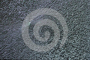 Broken glass window cracked pattern vandalism crash close-up impact
