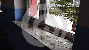 Broken glass of a window,sharp glass shard,broken glass close-up in the window