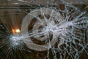 Broken glass window after a vandalism