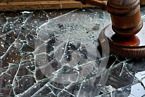 Broken Glass Window With Wooden Gavel