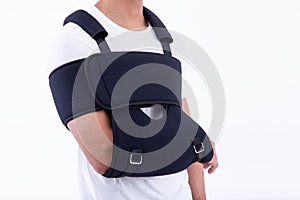 Broken hand wearing an arm brace