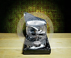 Broken the hard drive from the computer in the background of th