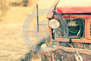 Broken head light rusty truck