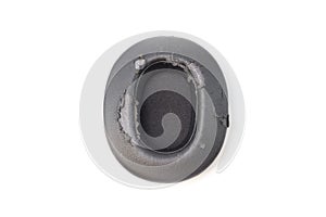 broken headphone pad from frequent use isolated on a white background