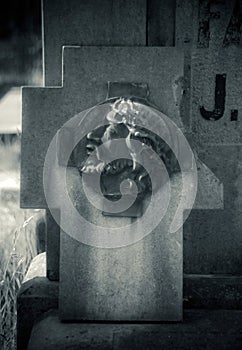 Broken headstone on a grave