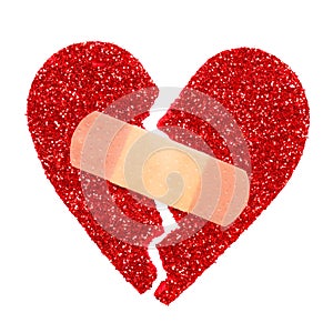 Broken Heart. Glitter ripped heart fixed with adhesive bandage