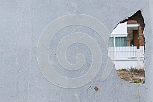 Broken hole on cement wall