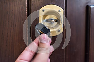 Broken house key stuck in door lock