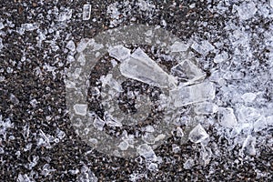 Broken icicles on a sidewalk in Montreal