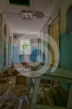 Broken interior of a village house in the Chernobyl Exclusion Zone in the Ukraine