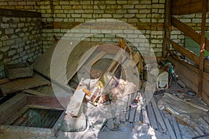 Broken interior of a village house in the Chernobyl Exclusion Zone in the Ukraine