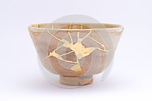 Broken Japanese handmade bowl restored with the antique japanese kintsugi real gold technique