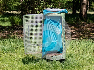 Broken litter bin in the park