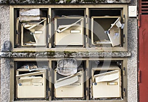 Broken mailboxes of an abandoned building