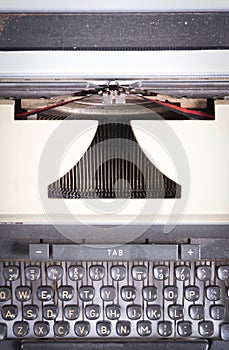 Broken metal typewriter, vintage object