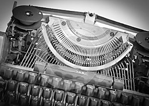 Broken metal typewriter, vintage object