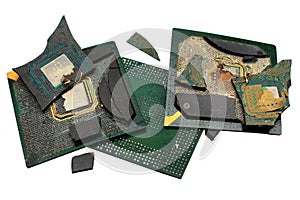 Broken microchips in BGA plastic case, isolated on white background