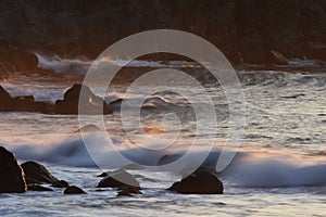 Broken morning waves on the reef