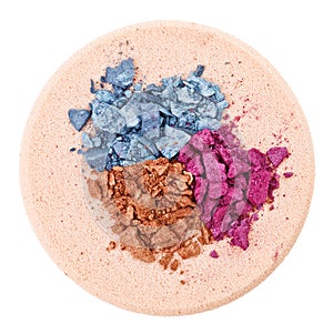 Broken multicolor eyeshadow over makeup sponge